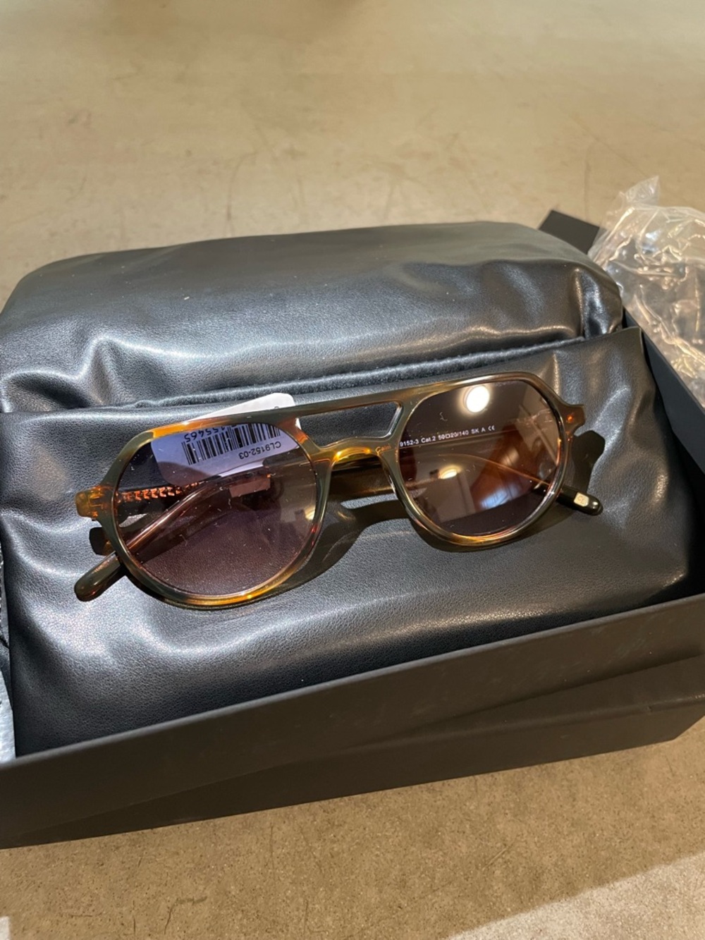 Carolina Lemke Round Tortoiseshell Sunglasses with Blue/Brown Lenses